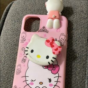 iPhone 11 Pro Max case with attached pop socket.